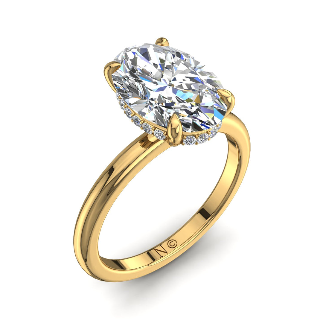 Bague solitaire 1.30 carat or jaune diamant ovale et diamants ronds Romy